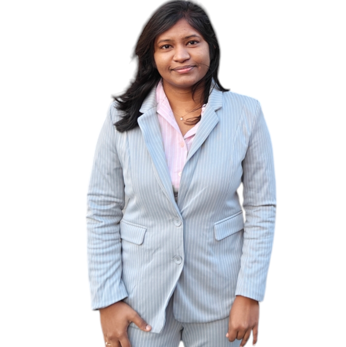 A woman in a light gray pinstriped blazer over a light pink shirt stands facing forward against a white background.
